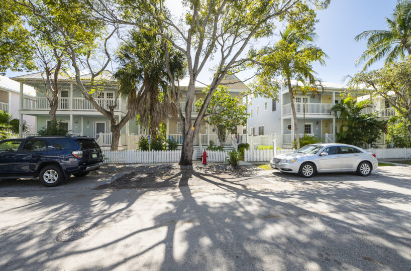 Perfectly located 2 bedroom, 1.5 bath Key West Golf Club townhome overlooking the picturesque golf course and lake